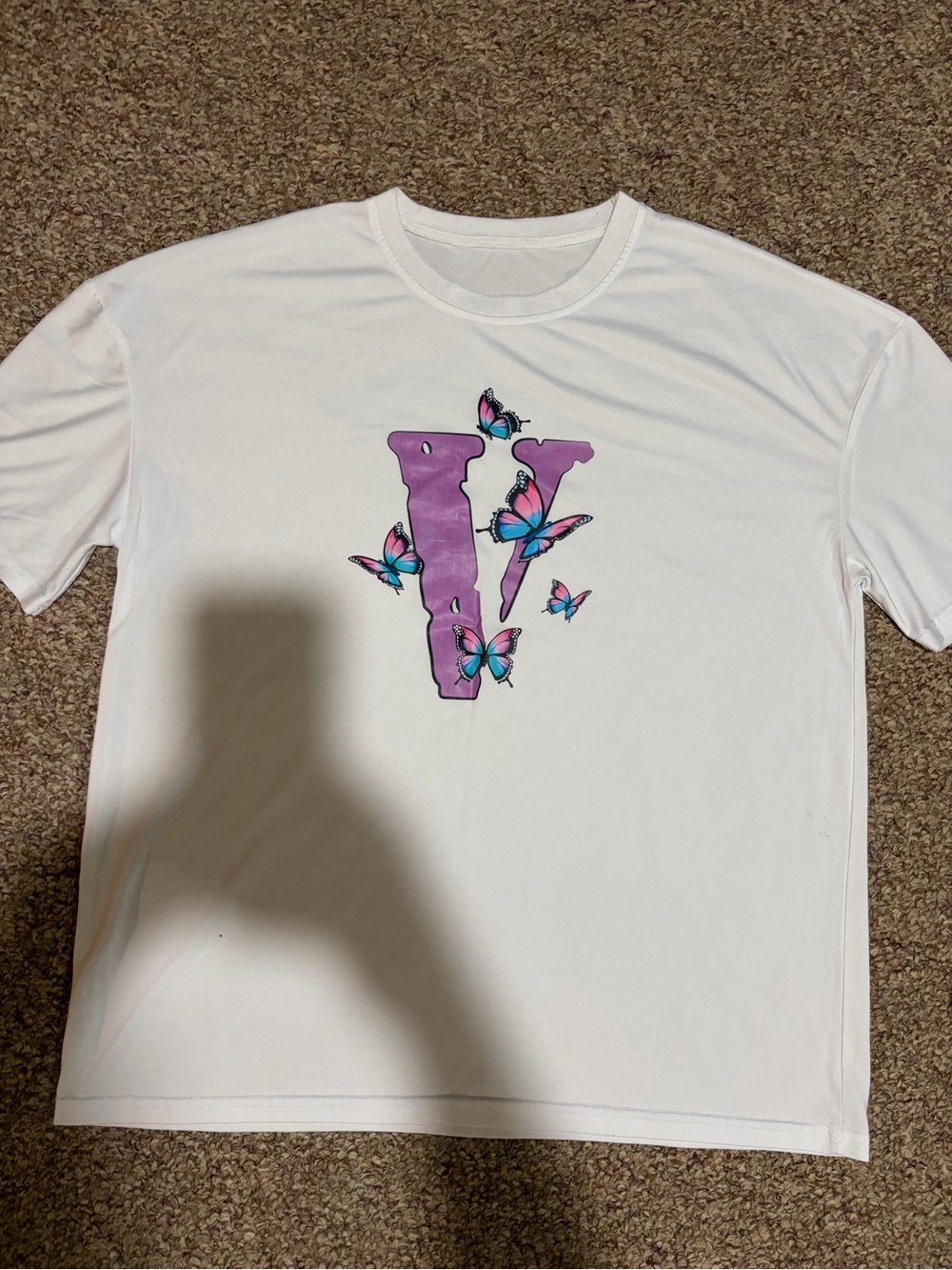 White T-Shirt with Purple 'V' and Blue Butterfly Graphic VLONE
